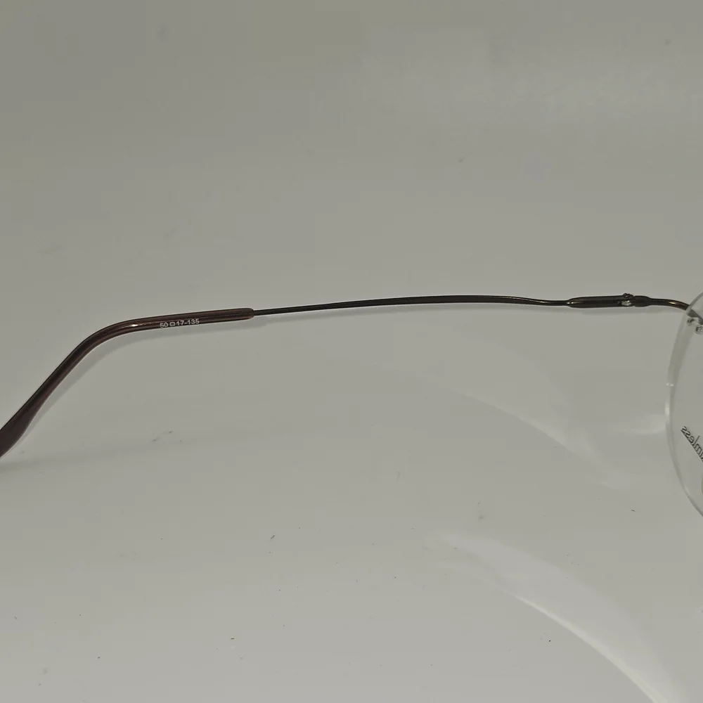 Naturally‎ Rimless NR 372 Eyeglasses Frame 50-17-135 Brown